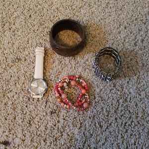 3 bracelets and a watch